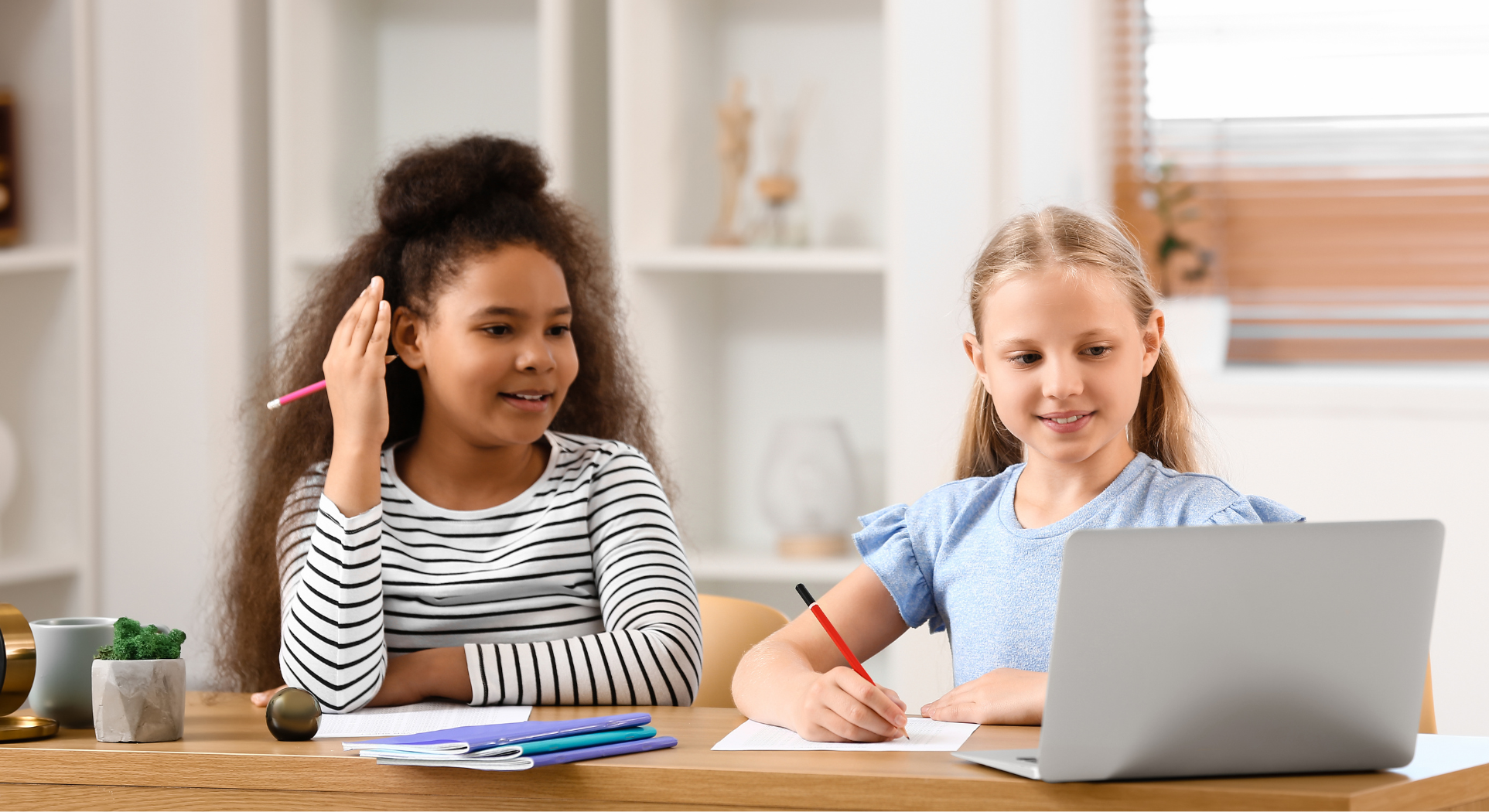 A parent proudly watching a child enthusiastically revise