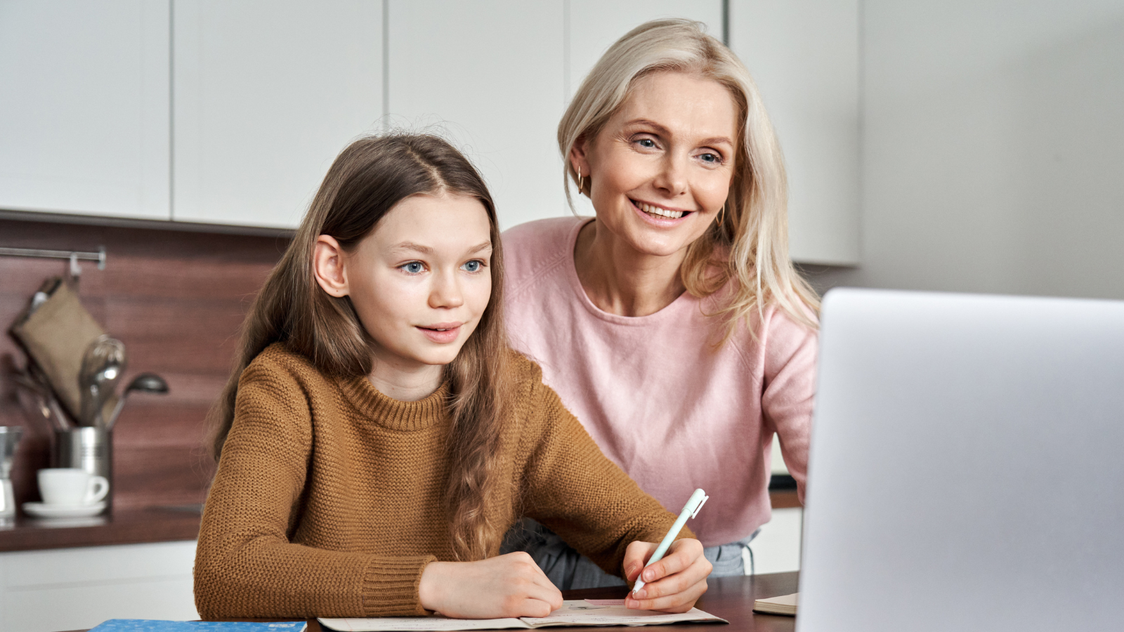 student doing iseb pre-tests mock tests at home with parent 