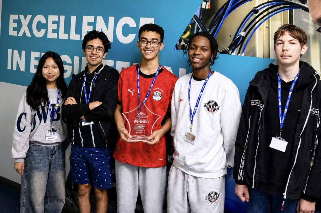 Cambridge Regional College students celebrating first place at the 2026 CENTURY Spring Challenge, holding their trophy and medals