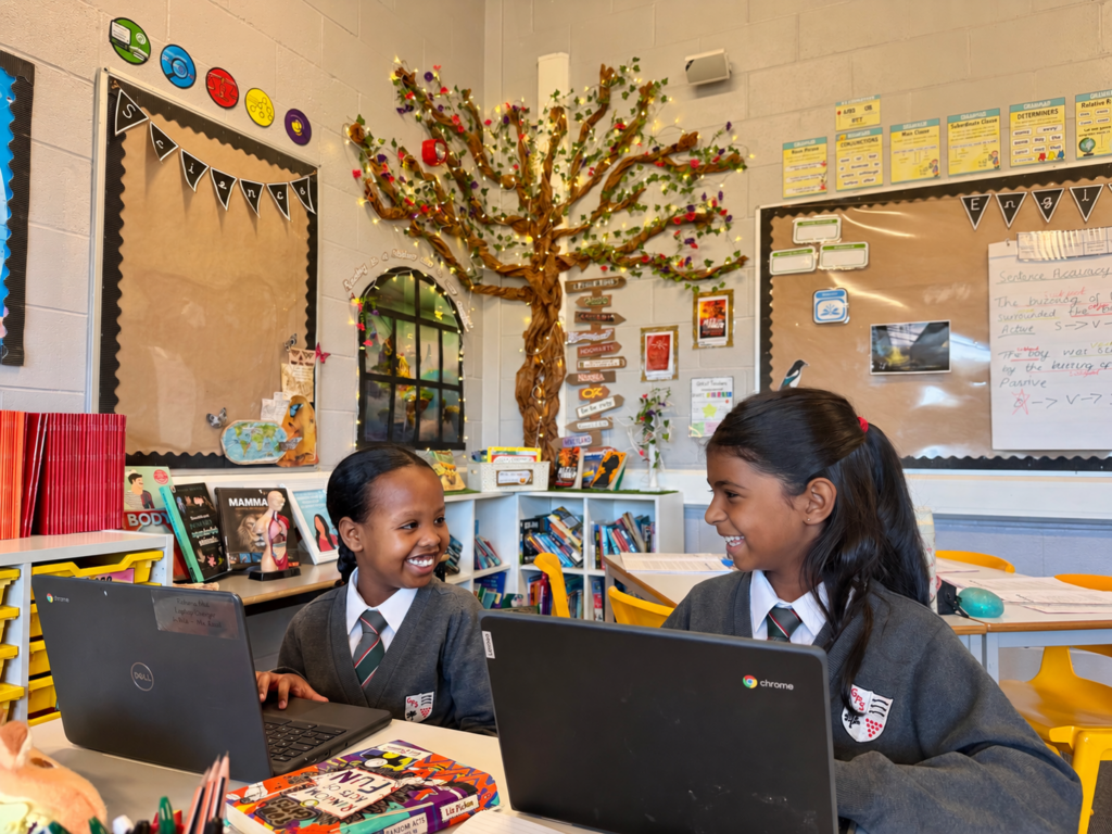 Pupils at Gifford Primary School completing self-marking homework on Chromebooks, part of the school's approach to reducing teacher workload